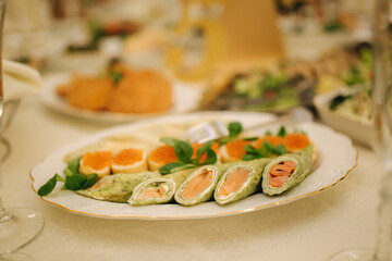 Table with food and drink on wedding. Served and decorated table in restaurant