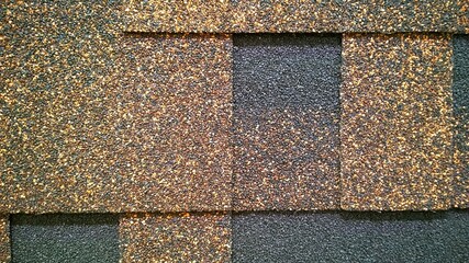 Texture background from asphalt roof and wall shingle. Imitation of pattern of gray and brown bricks. Gradient effect. Rectangle shape. Bituminous tiles. Granular surface. Copy space. Geometry 
