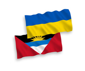 Flags of Antigua and Barbuda and Ukraine on a white background