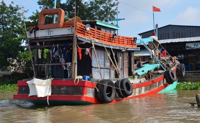 Fishing and house boat on Mekong River in Cambodia