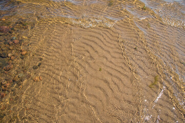 sand waves pattern under the water