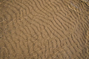 sand waves pattern under the water