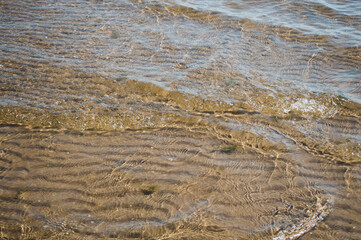 sand waves pattern under the water