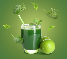 Glass of tasty juice and flying ingredients on color background
