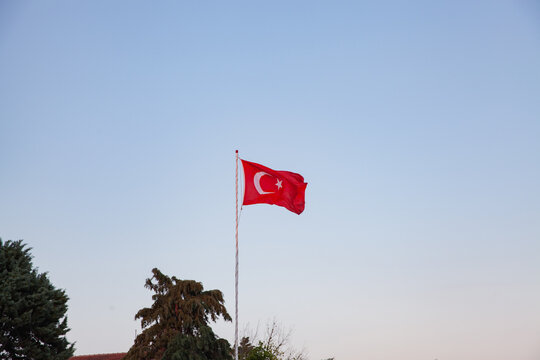Picture of flag of Turkey. National flag consisting of a red background with a central white star and crescent. Turkish flag.