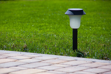 use of alternative energy - solar-powered garden lights