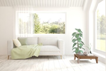 White living room with sofa and summer landscape in window. Scandinavian interior design. 3D illustration