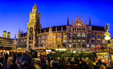 Munich, Germany - December 3: famous christmas market with sales booths and visitors on the marienplatz in Munich on December 3, 2019 - obrazy, fototapety, plakaty