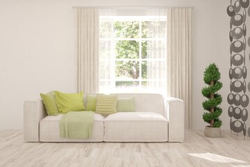 Fototapeta premium White living room with sofa and summer landscape in window. Scandinavian interior design. 3D illustration