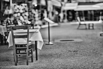 abstract blurred background street cafe in the city, no people, empty, summer restaurant quarantine