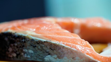 salmon steak on a black background