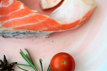 salmon and tomatoes on a plate
