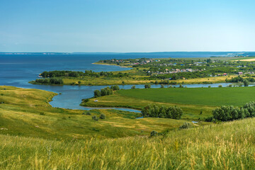 Fototapeta na wymiar Russian landscape on the Volga, green hills and Islands