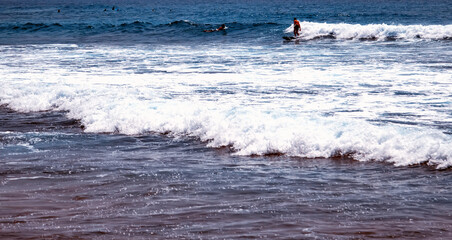 Surfer Surfing Bodyboarding in the ocean Bali Surf