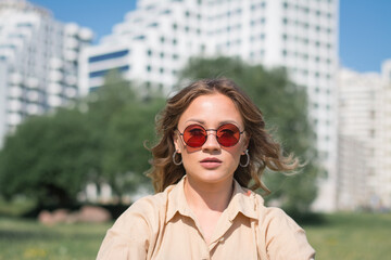 stylish girl in sunglasses portrait