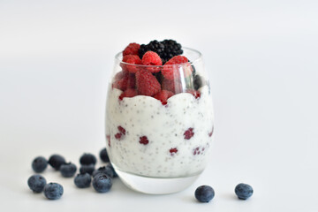 Healthy food and breakfast. glass of delicious homemade smoothie, dessert made from chia and berries. delicious milkshake, vegan raw food. Summer card. Good morning.Selective focus.