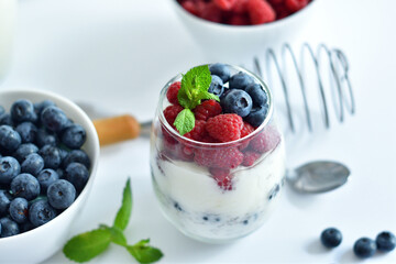 Healthy food and breakfast. glass of delicious homemade smoothie, dessert made from chia and berries. delicious milkshake, vegan raw food. Summer card. Good morning.Selective focus.