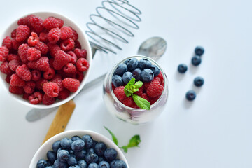 Healthy food and breakfast. glass of delicious homemade smoothie, dessert made from chia and berries. delicious milkshake, vegan raw food. Summer card. Good morning.Selective focus.