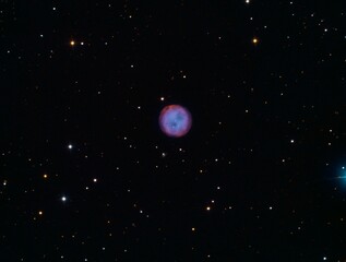 Fototapeta na wymiar Owl Nebula from my backyard Owl Nebula (also known as Messier 97, M97 or NGC 3587) is a planetary nebula located approximately 2,030 light years away in the constellation Ursa Major. 