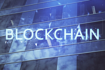Multi exposure of cryptocurrency theme hologram drawing and city veiw background. Concept of...