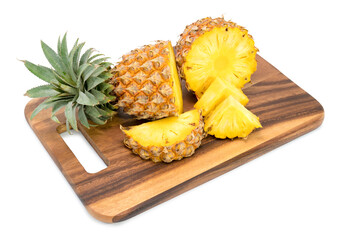 Fresh pineapple with slices isolated on white