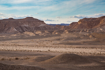 Fototapeta na wymiar Israeli Desert views with harsh desert and dry riverbed 