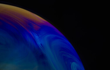 Structure texture soap bubble abstract black background.