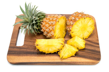 Fototapeta na wymiar Fresh pineapple with slices isolated on white
