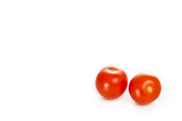 fresh cherry tomatoes on a white background
