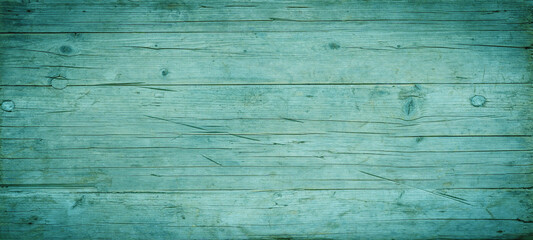 Green turquoise grunge painted abstract wooden board wall texture background banner
