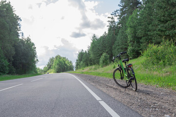 Fototapeta premium Bicycle outdoors in summer on the road