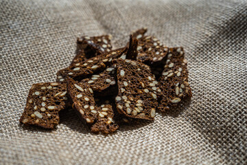 dark rye crackers with seeds. Rustic style
