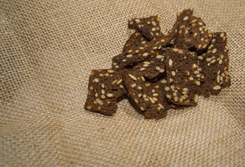 Bread thin crackers with sunflower seeds. Rustic style