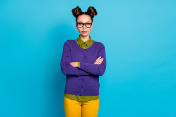 Portrait of her she nice attractive pretty smart clever content girl geek freelancer folded arms isolated on bright vivid shine vibrant blue green teal turquoise color background