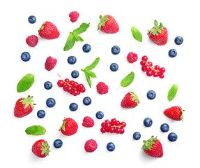 Fototapeta na wymiar Fruit pattern of assorted wild berries isolated on white background. Top view.