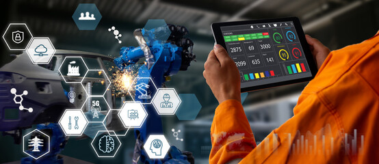 smart factory which use futuristic technology which combine big data, iot, 5g, machine deep learning, automation robot, augmented mixed virtual reality, digital twin, artificial intelligence