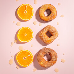 set of sweet donuts with orange topdown