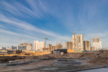 Fototapeta premium Development of a new district with high multi-storey buildings