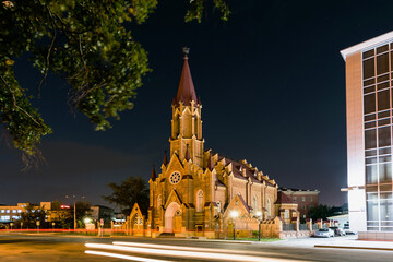 Russia, Irkutsk - June 30, 2020: Organ Hall. Irkutsk Regional Philharmonic. Roman Catholic Polish Church at night in summer