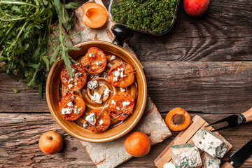 Nutrition and diet food, grilled peaches with blue cheese and microgreens, Vegan food. Flat lay. Banner. Top view