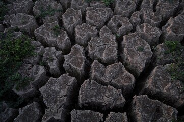 Top view of cracked soil texture background. Global warming