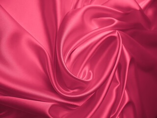 Beautiful elegant wavy light pink satin silk luxury cloth fabric texture, abstract background design. Copy space