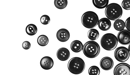 Black sewing buttons isolated on white background, top view