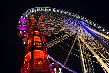 Ferris Wheel at Night . Amusement Park Illuminated in the Night 