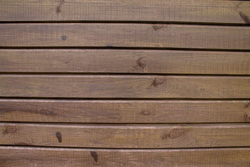 Obraz premium Texture of an old brown wooden wall. The slats are installed vertically.