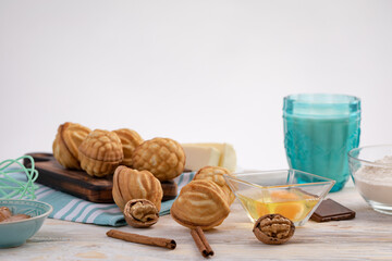nuts with condensed milk and ingredients - condensed milk, egg, cinnamon, chocolate, walnut, flour, milk.