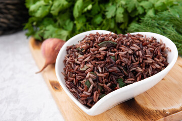 organic red rice with vegetable food background