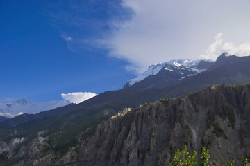 Naklejka na ściany i meble Mountain range on the eastern side of the Annapurna circuit. Photographed 2015, five months after the big earthquake.