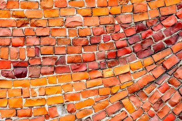 Multicolored mosaic panel of red-orange smalt, elements of the old Soviet monument