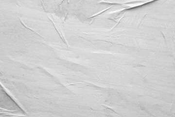 Blank white crumpled and creased paper poster texture background